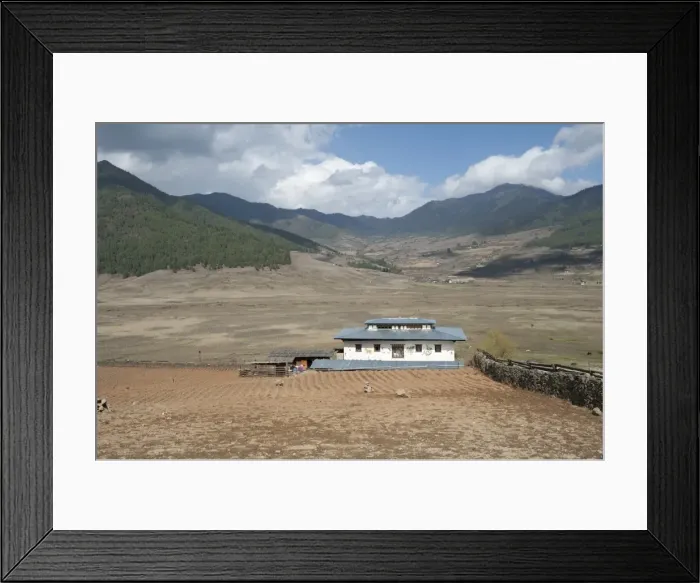 Framed Print : Small farmstead in the wide and shallow Phobjikha Valley, where the black-necked Framed Print : Small farmstead in the wide and shallow Phobjikha Valley, where the black-necked