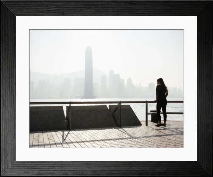 Framed Print : Young woman standing on Tsim Sha Tsui Waterfront, Kowloon, Hong Kong, China, Asia Framed Print : Young woman standing on Tsim Sha Tsui Waterfront, Kowloon, Hong Kong, China, Asia