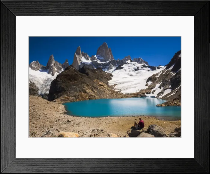 Framed Print : Hikers at Lago de los Tres (Laguna de los Tres) with Mount Fitz Roy (Cerro Chalten) behind Framed Print : Hikers at Lago de los Tres (Laguna de los Tres) with Mount Fitz Roy (Cerro Chalten) behind