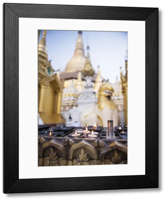 Framed Print : Burning candles at Shwedagon Pagoda (Shwedagon Zedi Daw) (Golden Pagoda), Yangon (Rangoon) Framed Print : Burning candles at Shwedagon Pagoda (Shwedagon Zedi Daw) (Golden Pagoda), Yangon (Rangoon)