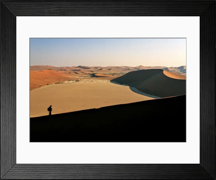 Framed Print : Profile of a hiker on the sand dune shaped by the wind, Deadvlei, Sossusvlei, Namib Desert Framed Print : Profile of a hiker on the sand dune shaped by the wind, Deadvlei, Sossusvlei, Namib Desert