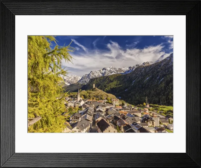 Framed Print : View of Ardez village surrounded by woods and snowy peaks Lower Engadine, Canton of Graubunden Framed Print : View of Ardez village surrounded by woods and snowy peaks Lower Engadine, Canton of Graubunden