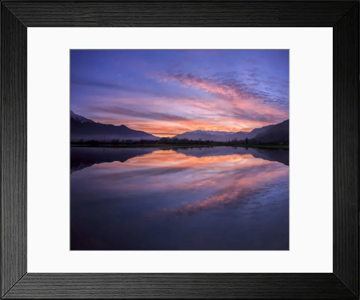 Framed Print : Panoramic view of Pian di Spagna flooded with snowy peaks reflected in the water at sunset