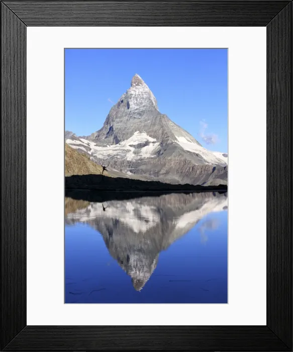 Framed Print : Hiker admiring the Matterhorn reflected in Lake Stellisee, Zermatt, Canton of Valais Framed Print : Hiker admiring the Matterhorn reflected in Lake Stellisee, Zermatt, Canton of Valais