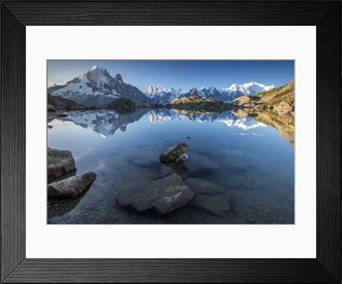 Framed Print : Snowy peaks of Aiguilles Verte, Dent Du Geant, and Mont Blanc are reflected in Lac Blanc Framed Print : Snowy peaks of Aiguilles Verte, Dent Du Geant, and Mont Blanc are reflected in Lac Blanc