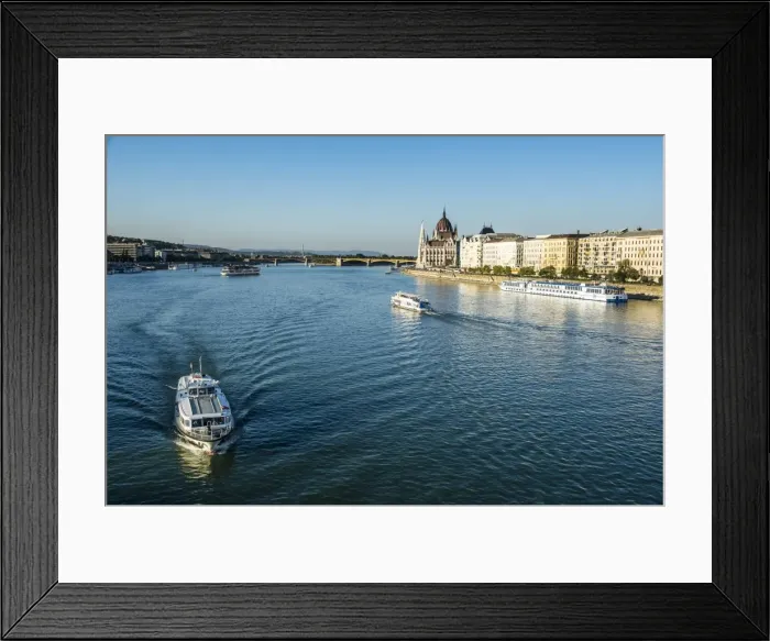 Framed Print : Little ferries on the River Danube in front of the Panorama of Pest, Budapest, Hungary Framed Print : Little ferries on the River Danube in front of the Panorama of Pest, Budapest, Hungary