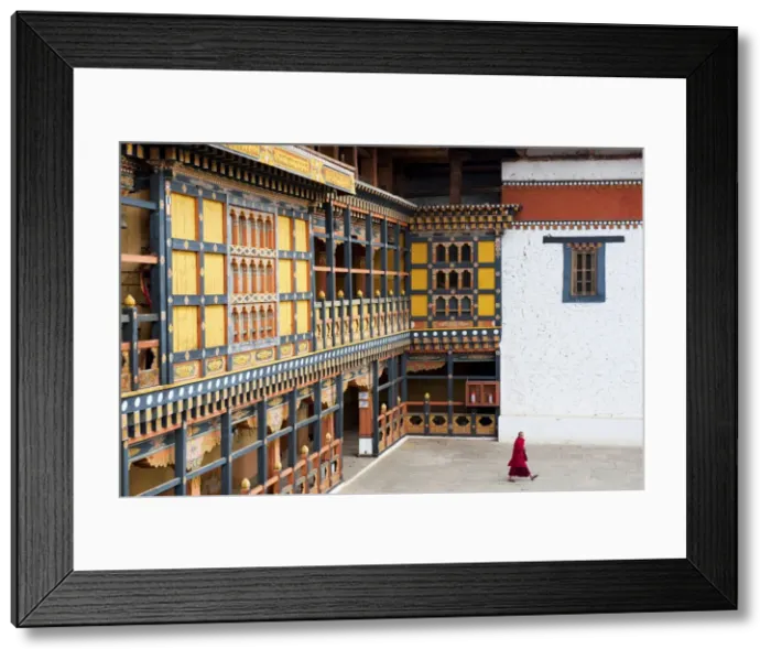 Framed Print : Monk walking through Rinpung Dzong, Paro District, Bhutan, Asia Framed Print : Monk walking through Rinpung Dzong, Paro District, Bhutan, Asia