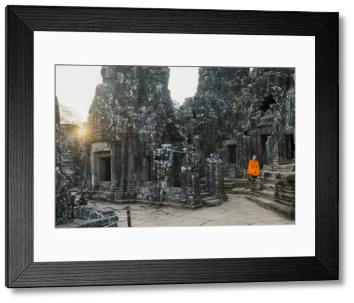 Framed Print : Monk sitting sitting in the Bayon temple, UNESCO World Heritage Site, Angkor, Siem Reap Framed Print : Monk sitting sitting in the Bayon temple, UNESCO World Heritage Site, Angkor, Siem Reap