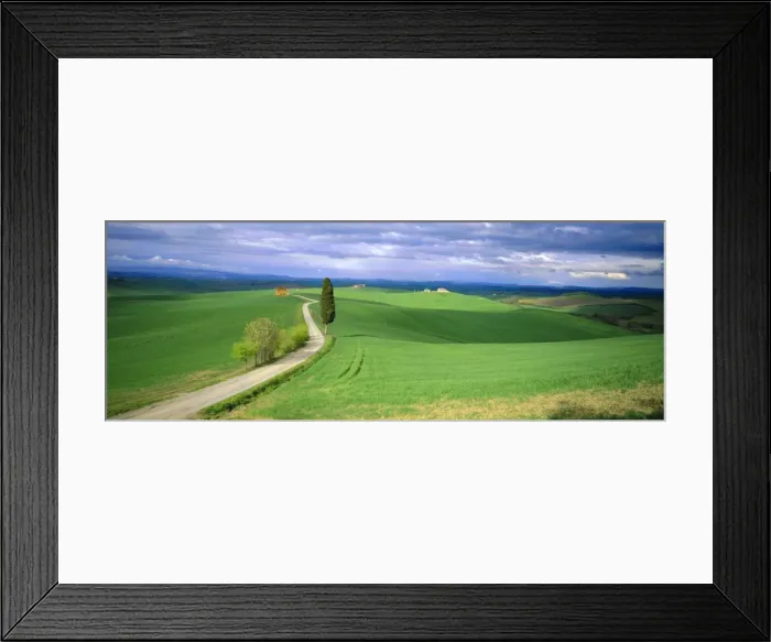 Framed Print : Road running through open countryside Framed Print : Road running through open countryside
