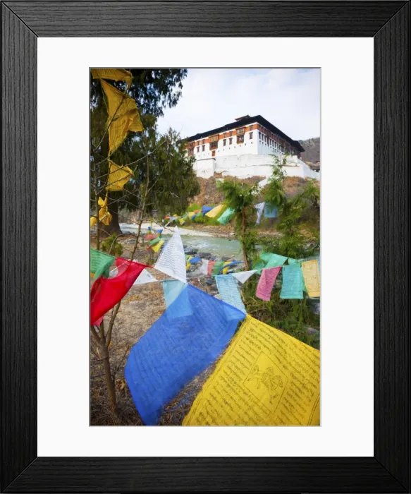 Framed Print : Prayer flags and Rinpung Dzong, Paro District, Bhutan, Asia Framed Print : Prayer flags and Rinpung Dzong, Paro District, Bhutan, Asia