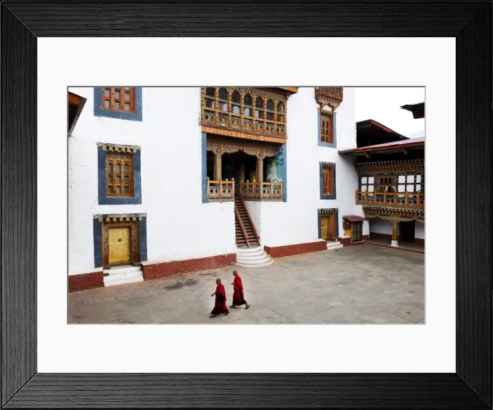 Framed Print : Monks walking through the courtyard of Punakha Dzong, Punakha District, Bhutan, Asia Framed Print : Monks walking through the courtyard of Punakha Dzong, Punakha District, Bhutan, Asia