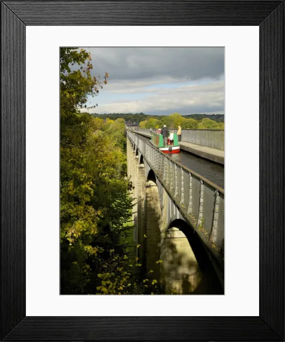 Framed Print : Narrowboat crossing the River Dee in autumn on the Pontcysyllte Aqueduct, built by Thomas Telford Framed Print : Narrowboat crossing the River Dee in autumn on the Pontcysyllte Aqueduct, built by Thomas Telford