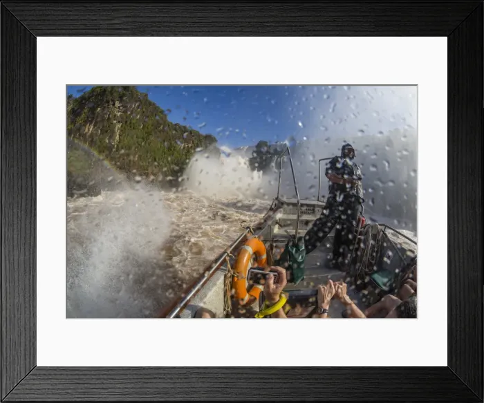 Framed Print : Tourists take a river boat to the base of the falls, Iguazu Falls National Park Framed Print : Tourists take a river boat to the base of the falls, Iguazu Falls National Park
