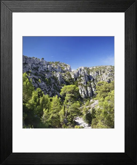 Framed Print : People hiking through rocky landscape of les Calanques, National Park, Cassis, Provence Framed Print : People hiking through rocky landscape of les Calanques, National Park, Cassis, Provence