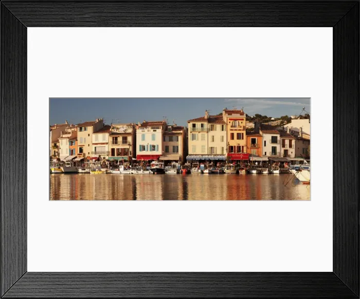 Framed Print : Fishing boats at the harbour, restautants and street cafes on the promenade, Cassis Framed Print : Fishing boats at the harbour, restautants and street cafes on the promenade, Cassis