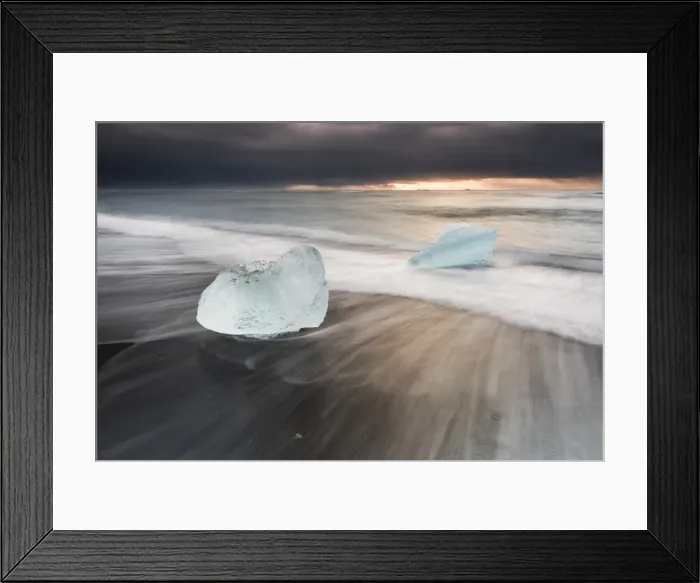 Framed Print : Icebergs at sunrise on Jokulsarlon Beach, a black volcanic sand beach in South East Iceland Framed Print : Icebergs at sunrise on Jokulsarlon Beach, a black volcanic sand beach in South East Iceland