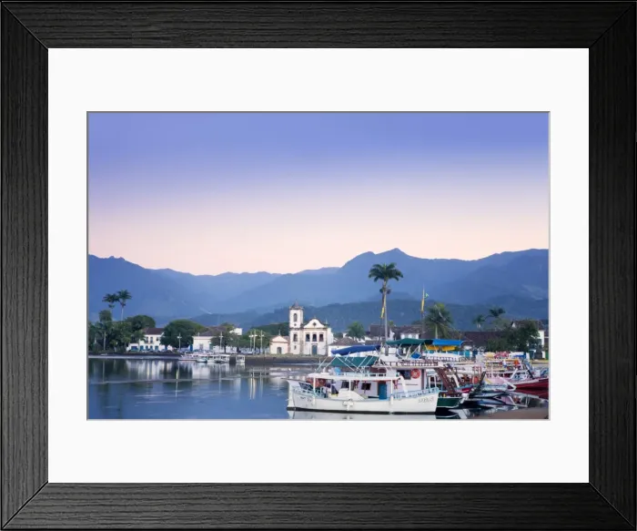 Framed Print : Docks at Paraty with the Serra da Bocaina mountains behind and the church of Nossa Framed Print : Docks at Paraty with the Serra da Bocaina mountains behind and the church of Nossa