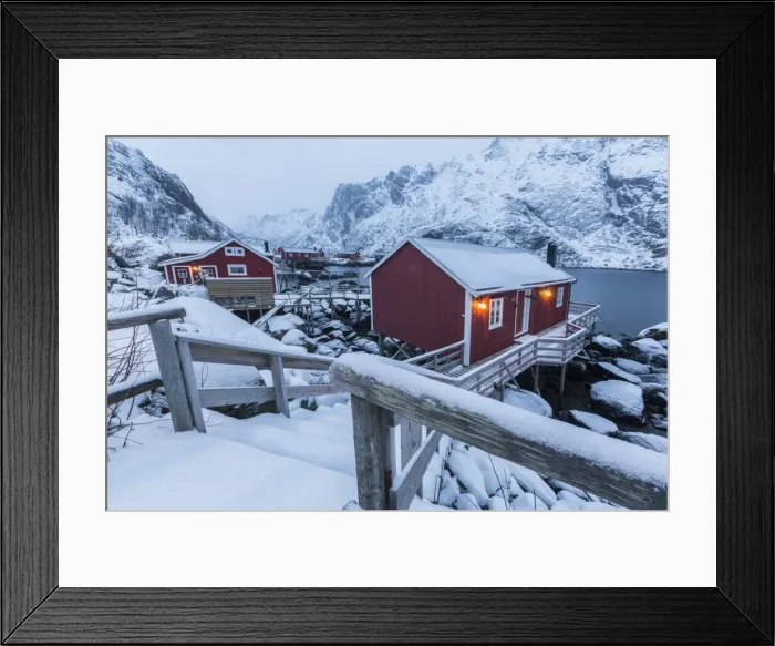 Framed Print : Typical fishermen houses called rorbu in the snowy landscape at dusk, Nusfjord, Nordland County Framed Print : Typical fishermen houses called rorbu in the snowy landscape at dusk, Nusfjord, Nordland County