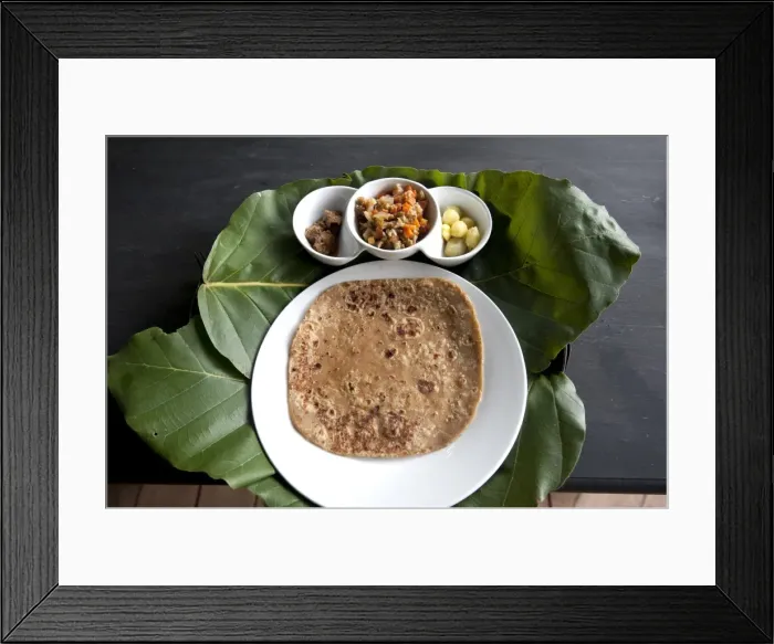 Framed Print : Burmese lunch of chapati with beef curry, vegetables and potatoes, served on teak leaf mat Framed Print : Burmese lunch of chapati with beef curry, vegetables and potatoes, served on teak leaf mat