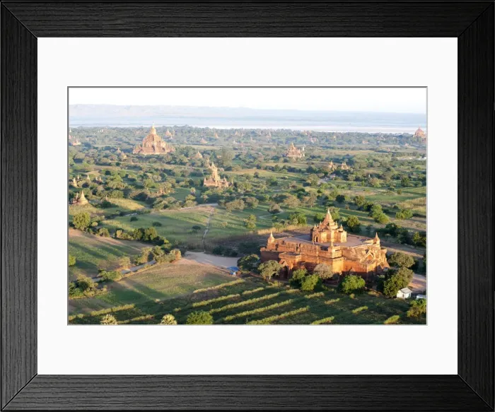 Framed Print : Early morning sunshine over the terracotta temples of Bagan, the Irrawaddy river in the distance Framed Print : Early morning sunshine over the terracotta temples of Bagan, the Irrawaddy river in the distance