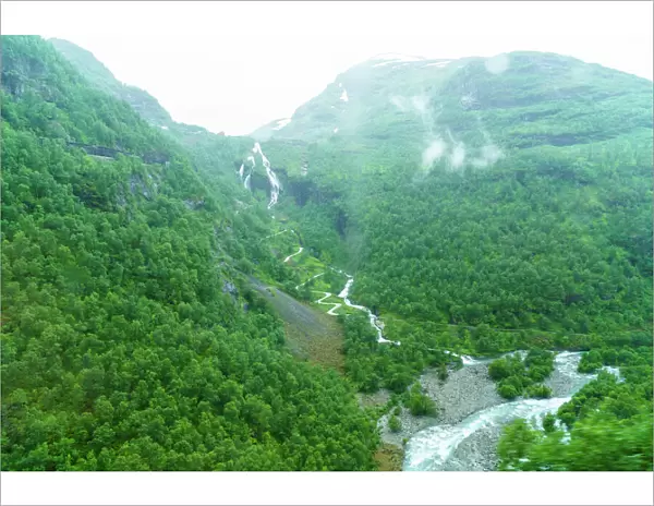 A view of waterfalls and forest from the Flam Railway, Flamsbana, Flam, Norway, Scandinavia