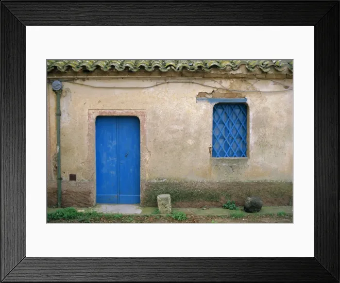Framed Print : House with blue door and window Framed Print : House with blue door and window
