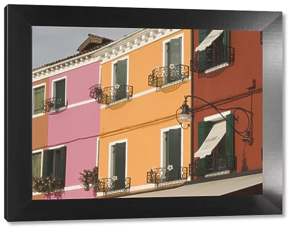 Coloured house fronts with windowboxes