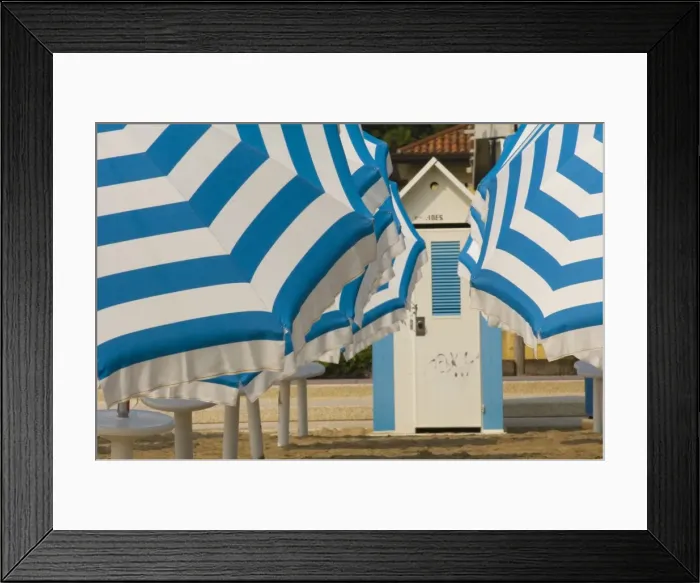 Framed Print : Umbrellas and beach hut Framed Print : Umbrellas and beach hut