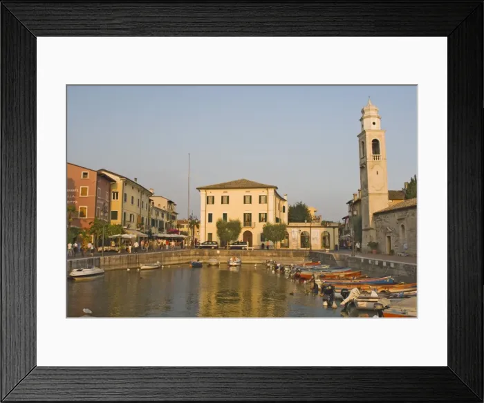 Framed Print : Evening light over the harbourside at Lazise Framed Print : Evening light over the harbourside at Lazise