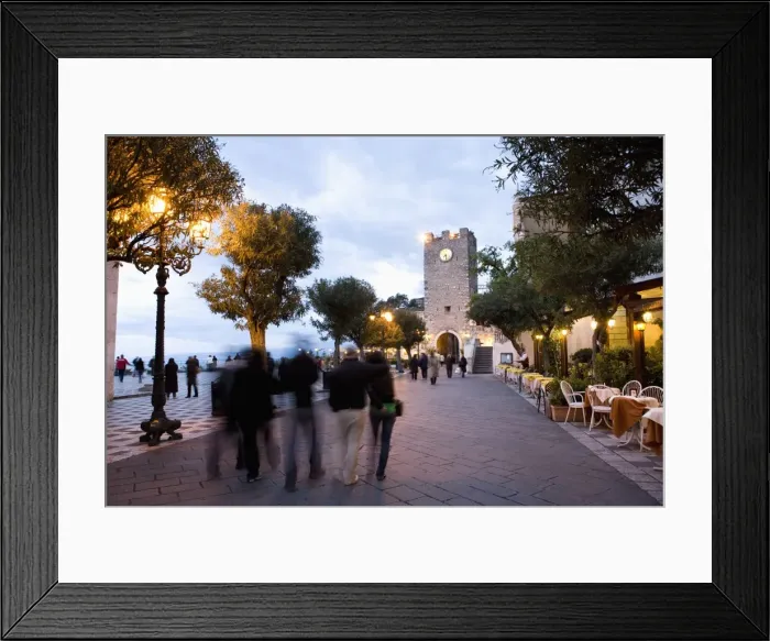 Framed Print : People strolling in Piazza IX Aprile in the evening Framed Print : People strolling in Piazza IX Aprile in the evening