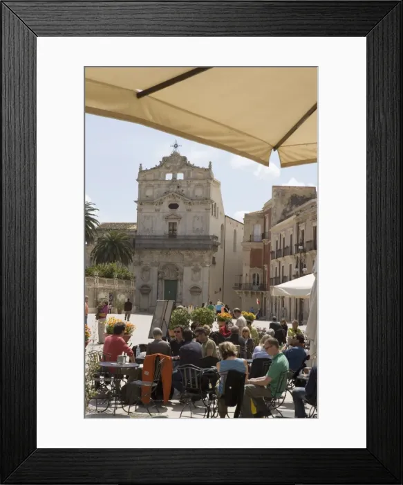 Framed Print : Facade of Santa Lucia alla Badia and cafe in the Piazza Duomo Framed Print : Facade of Santa Lucia alla Badia and cafe in the Piazza Duomo