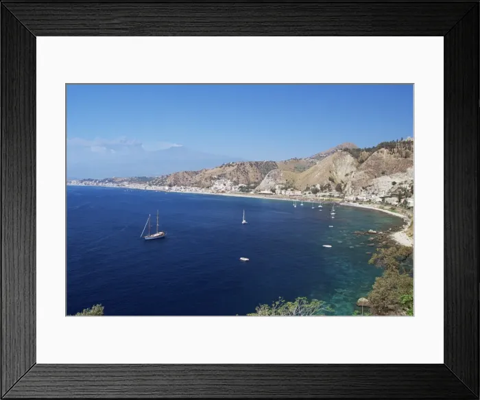 Framed Print : View of Taormina with Mount Etna in the background, Giardini Naxos, Sicily, Italy, Europe Framed Print : View of Taormina with Mount Etna in the background, Giardini Naxos, Sicily, Italy, Europe