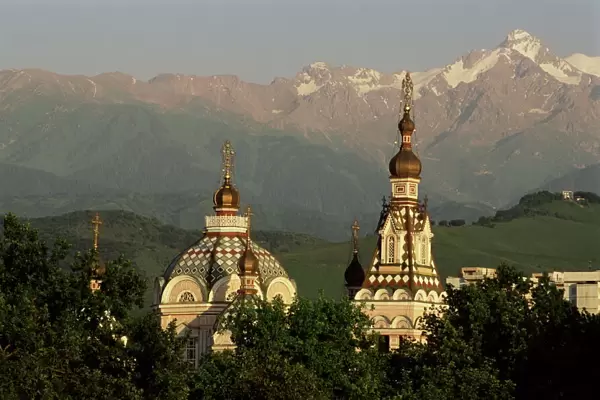Zenkov Cathedral and Tien Shan mountains