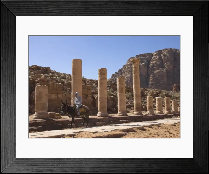 Framed Print : Bedouin on a donkey on the colonnaded street Framed Print : Bedouin on a donkey on the colonnaded street