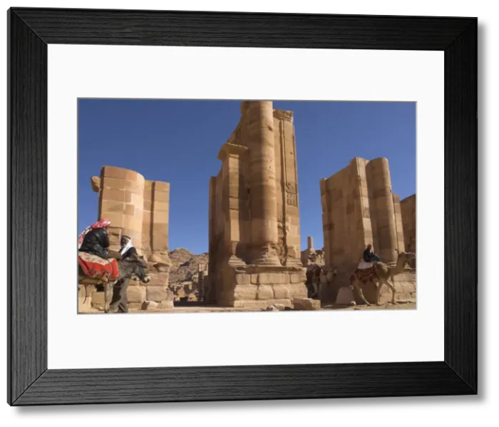 Framed Print : Bedouins riding donkey and camel Framed Print : Bedouins riding donkey and camel