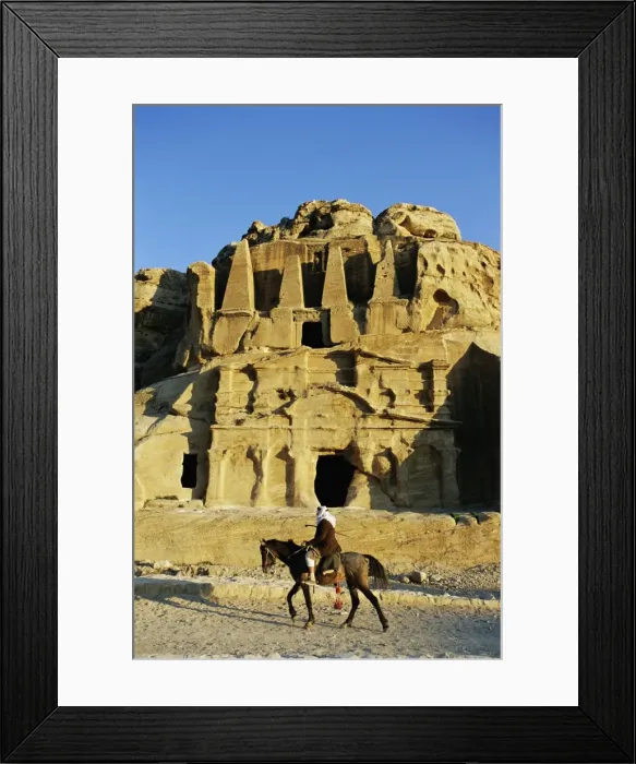 Framed Print : Rock cut tombs at Nabatean archaeological site