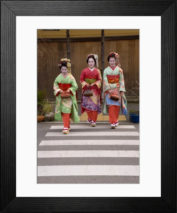 Framed Print : Maiko (apprentice geisha) walking in the streets of Framed Print : Maiko (apprentice geisha) walking in the streets of