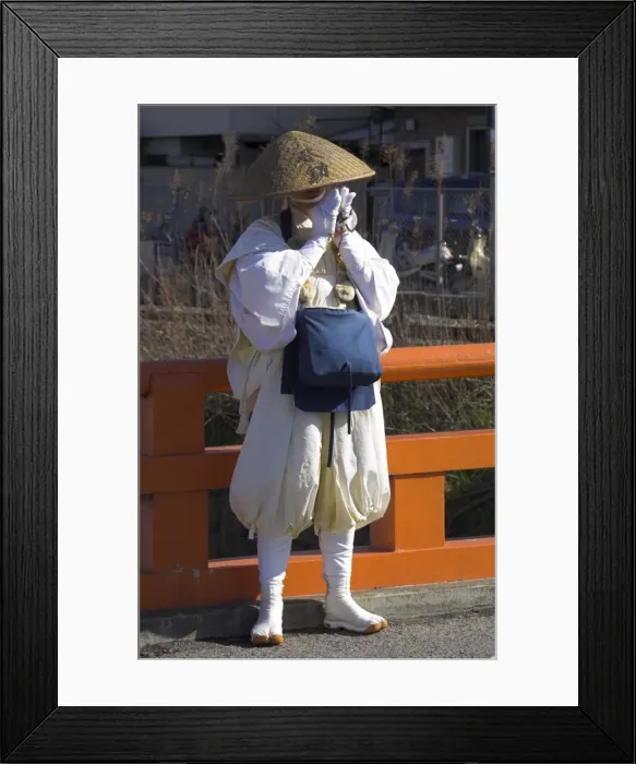 Framed Print : Pilgrim wearing traditional hat and white clothes standing Framed Print : Pilgrim wearing traditional hat and white clothes standing