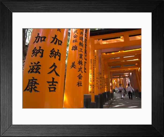 Framed Print : Pilgrims walking past toriis with donors names Framed Print : Pilgrims walking past toriis with donors names