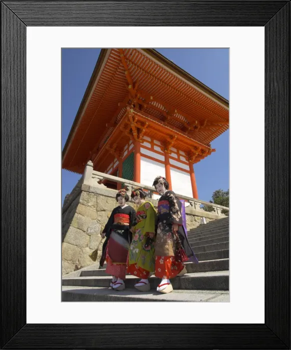 Framed Print : Three geishas in traditional dress walking down steps Framed Print : Three geishas in traditional dress walking down steps