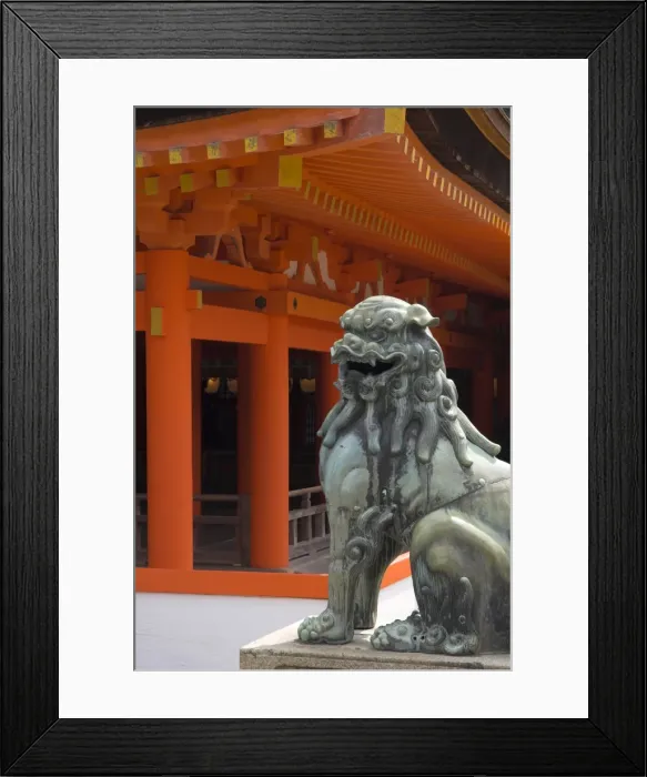 Framed Print : Bronze lion with traditional orange wooden roof beyond Framed Print : Bronze lion with traditional orange wooden roof beyond