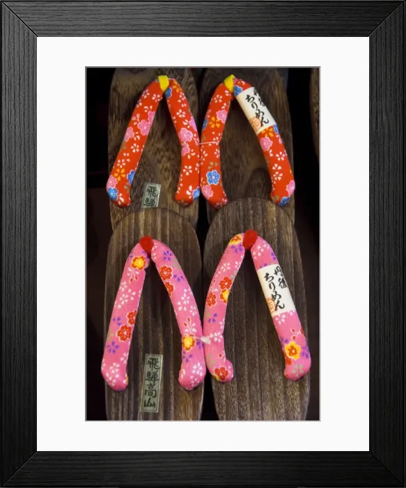 Framed Print : Traditional shoes with wooden sole and colourful straps Framed Print : Traditional shoes with wooden sole and colourful straps