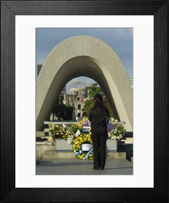 Framed Print : Girl praying at cenotaph Framed Print : Girl praying at cenotaph