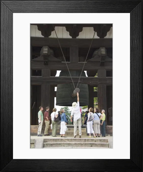 Framed Print : Tourists look at big cast iron bell Framed Print : Tourists look at big cast iron bell