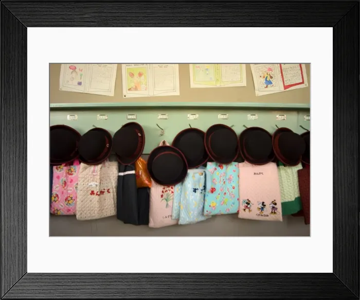 Framed Print : Student hats and bags hanging up Framed Print : Student hats and bags hanging up