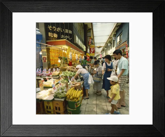Framed Print : Family shopping in a covered market in Tokyo Framed Print : Family shopping in a covered market in Tokyo