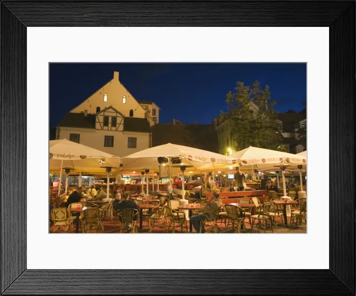 Framed Print : Al fresco dining at night in square of traditional buildings Framed Print : Al fresco dining at night in square of traditional buildings