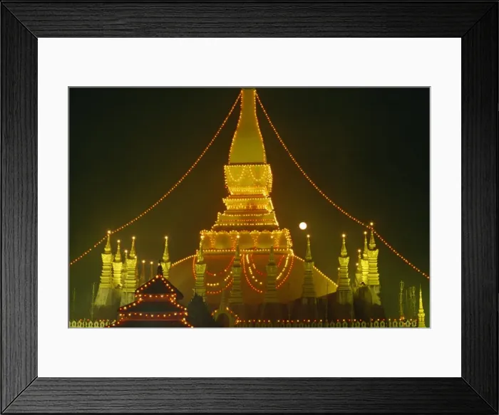 Framed Print : Lights illuminate the Great Stupa of Pha That Luang Framed Print : Lights illuminate the Great Stupa of Pha That Luang