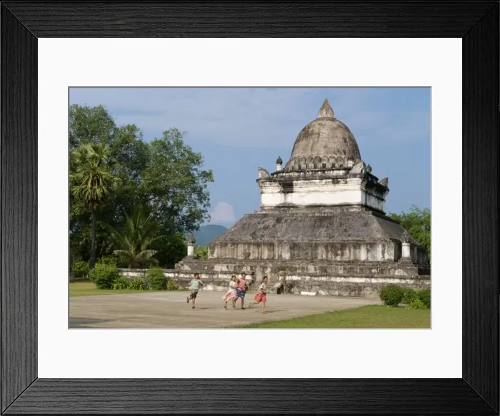 Framed Print : Children run in front of the Lotus Stupa at the Vixoun Framed Print : Children run in front of the Lotus Stupa at the Vixoun