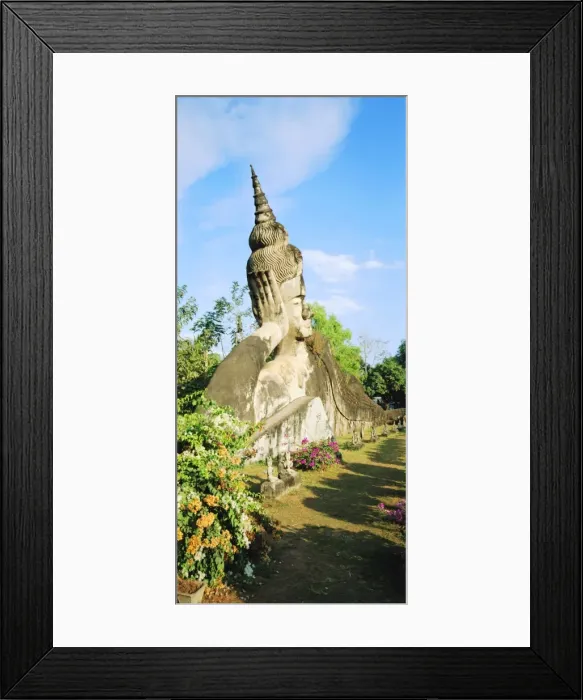 Framed Print : Reclining Buddha statue in the open at Xieng Khuan Framed Print : Reclining Buddha statue in the open at Xieng Khuan